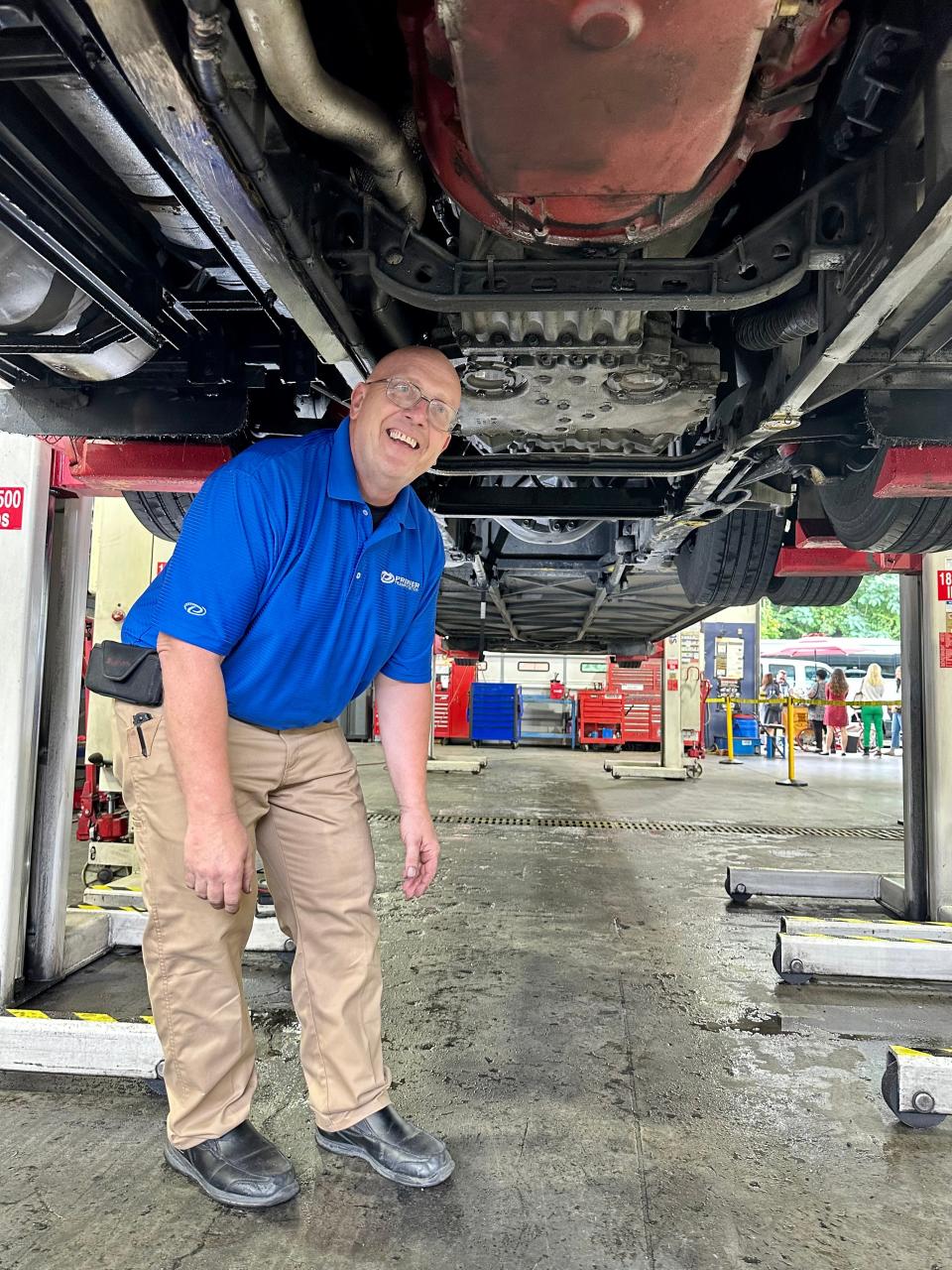 A service department employee wasn’t thrown under the bus – he’s fine with checking it out from below. Premier Transportation – East Tennessee’s top-tier coach service, trusted by the UT Volunteers – recently hosted “Breakfast & Buses” at their company headquarters in North Knoxville. Aug. 15, 2023
