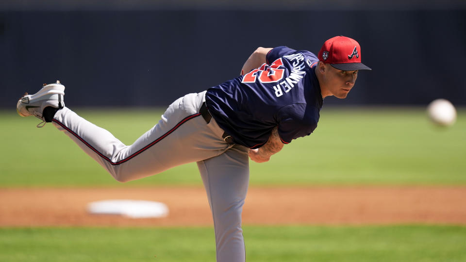 Atlanta Braves starting pitcher AJ Smith-Shawver throws during the first inning of a spring training baseball game against the New York Yankees Sunday, March 10, 2024, in Tampa, Fla. (AP Photo/Charlie Neibergall)