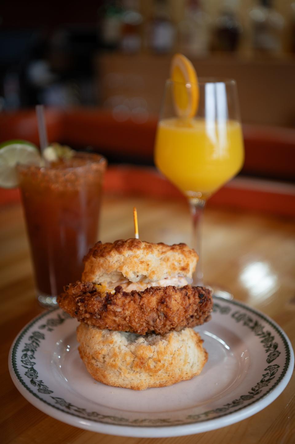 A fried chicken and pimento cheese biscuit at Regina's Westside in Asheville.