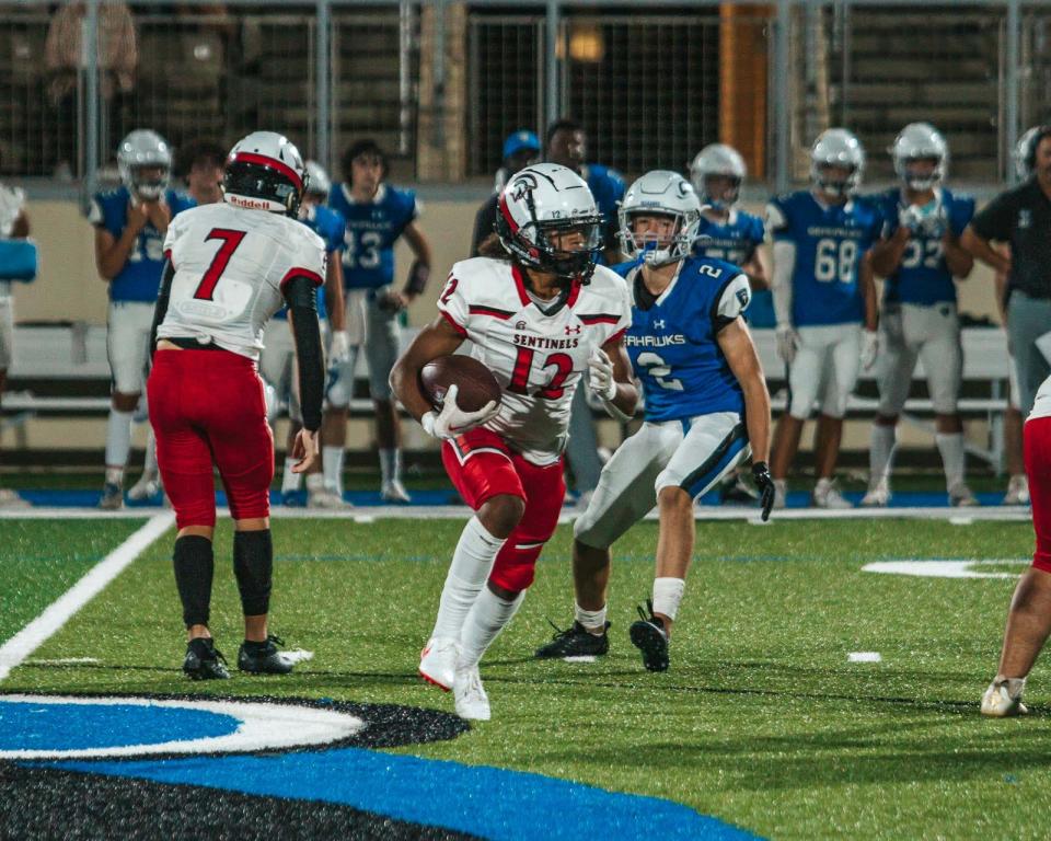 ECS eighth-grader Jyden German looks for yardage. ECS traveled to Community School of Naples on Friday, November 4th. The Sentinels finished with an undefeated regular season, winning 67-41 over the Seahawks.