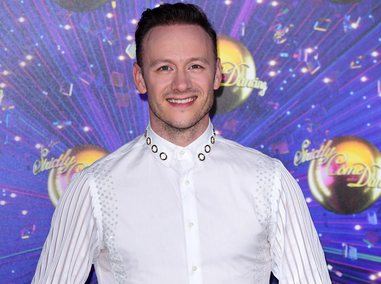 Kevin Clifton has 'I love Glasgow' tattooed on his foot (PA)