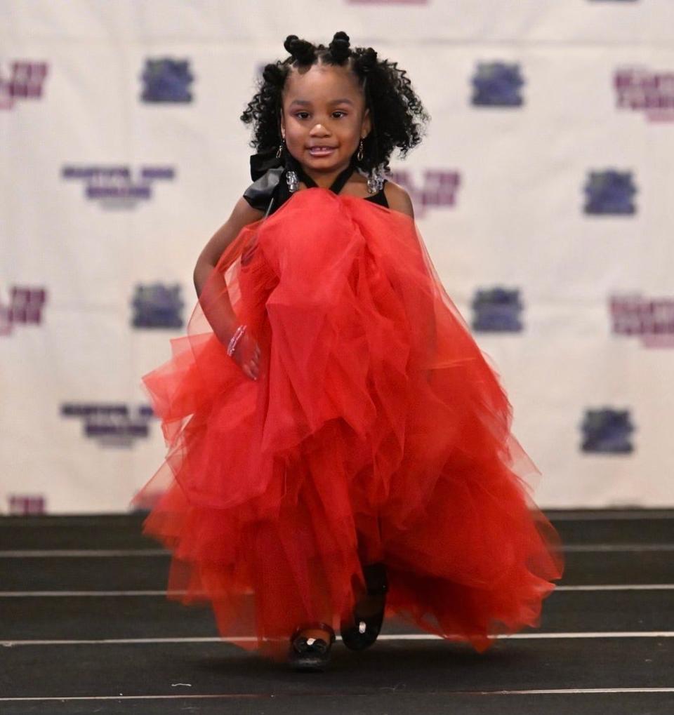 Fayetteville model Zuri Ealy, 3, walks the runway at the New York Fashion Week Beautiful You Fashion Tour, Sept. 9 2023.