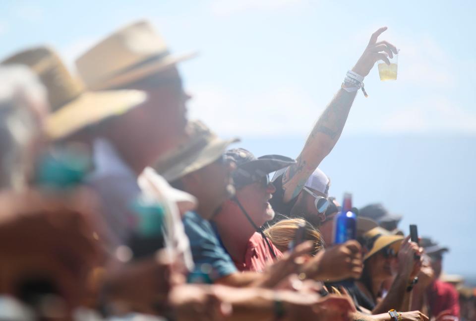 Drinks were hoisted as Gin Wigmore performed on a warm, sunny Sunday on the final day of the 2022 Bourbon and Beyond. Sept. 18, 2022