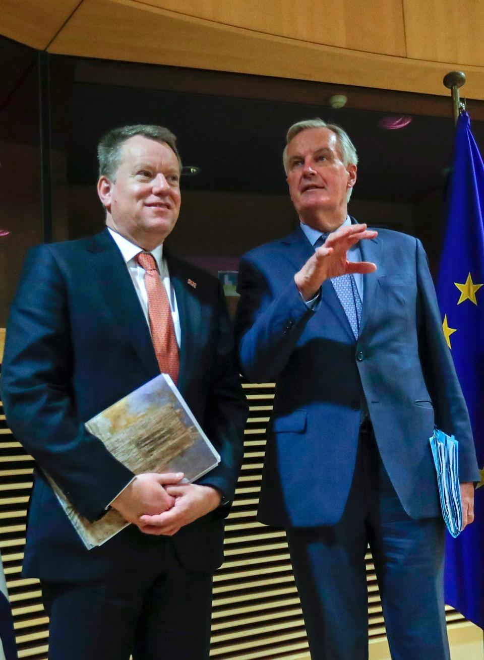 European Union chief Brexit negotiator Michel Barnier (R) and the British Prime Minister's Europe adviser David Frost pose for a photograph at start of the first round of post-Brexit trade deal talks between the EU and the United Kingdom, in Brussels on March 2, 2020. (Photo by Olivier HOSLET / POOL / AFP) (Photo by OLIVIER HOSLET/POOL/AFP via Getty Images)