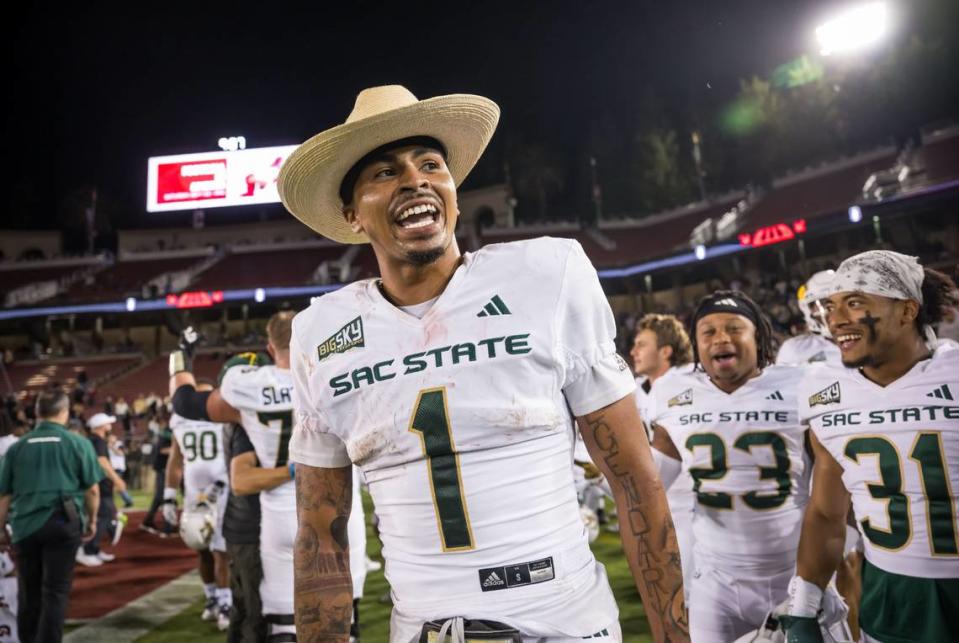 Sacramento State Hornets quarterback Kaiden Bennett (1) celebrates with teammates and fans after the Hornets beat the Stanford Cardinal 30-23 in the NCAA college football game Saturday, Sept. 16, 2023, at Stanford University.