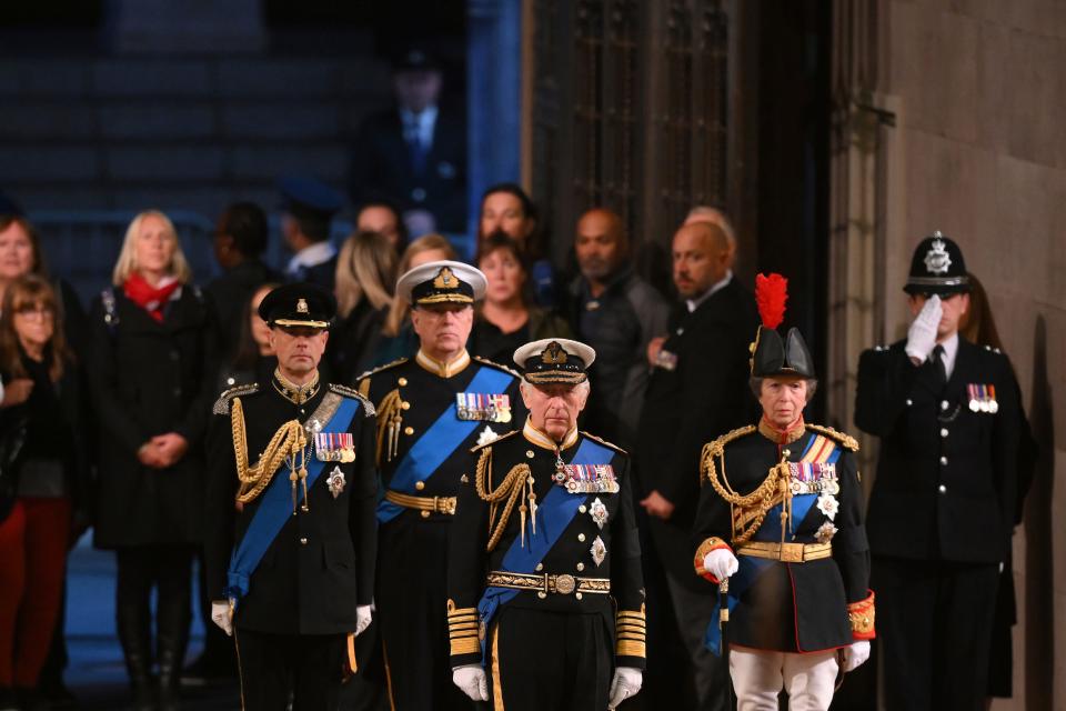 King Charles and his siblings stand vigil.
