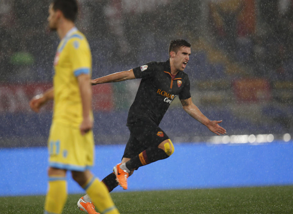 AS Roma midfielder Kevin Strootman celebrates after scoring during an Italian Cup, semifinal first leg match, between AS Roma and Napoli at Rome's Olympic stadium, Wednesday, Feb. 5, 2014. (AP Photo/Alessandra Tarantino)