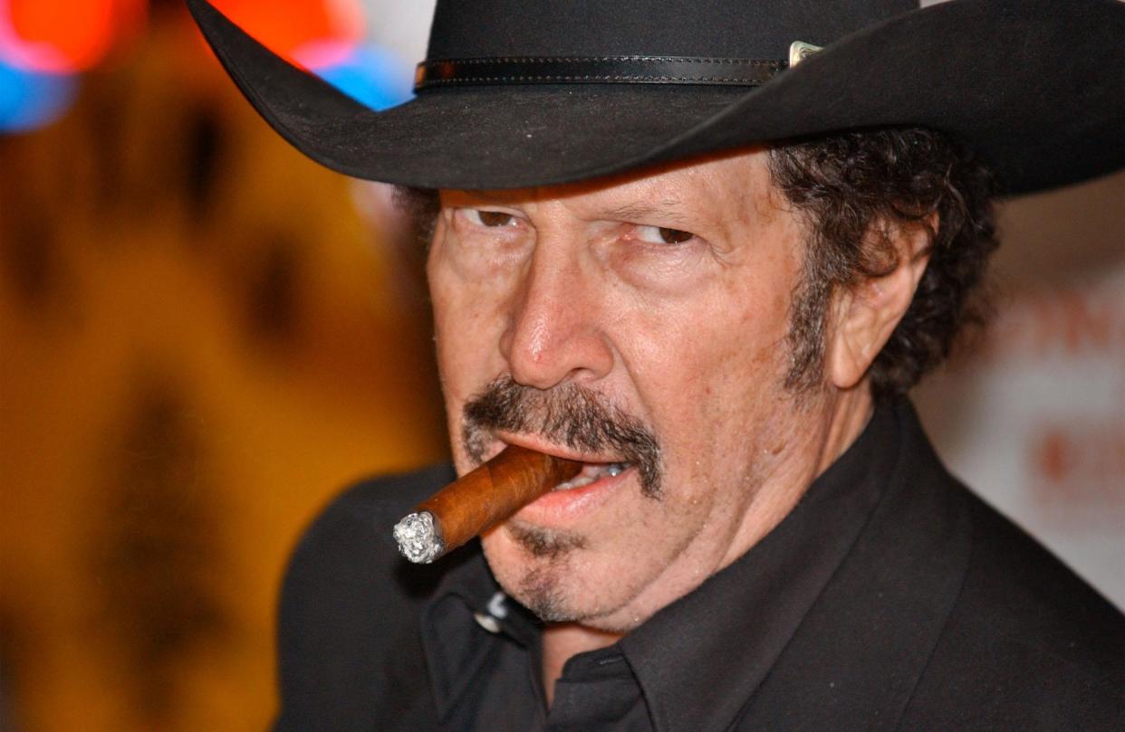 <span>Kinky Friedman campaigns for governor in Austin, Texas, on 15 December 2005.</span><span>Photograph: Reuters</span>