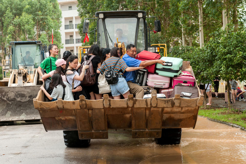 Students are transferred by a forklift