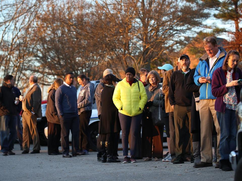 Voters wait in line to cast their ballot at a polling station setup in the St Thomas Episcopal Church on December 12, 2017 in Birmingham, Alabama. Alabama voters are casting their ballot for either Republican Roy Moore or his Democratic challenger Doug Jones in a special election to decide who will replace Attorney General Jeff Sessions in the U.S. Senate.  (Photo by Joe Raedle/Getty Images) (Getty Images)