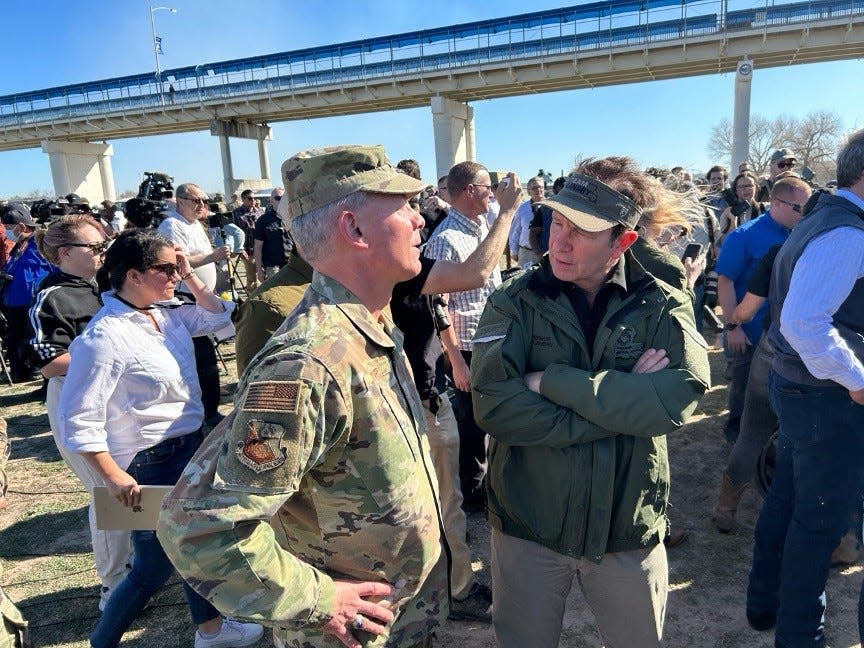 Louisiana Gov. Landry speaks with Texas Major General Thomas Suelzer Sunday, Feb. 4, at Eagle Pass, Texas, where he joined Texas Gov. Greg Abbott for a press conference about border security.