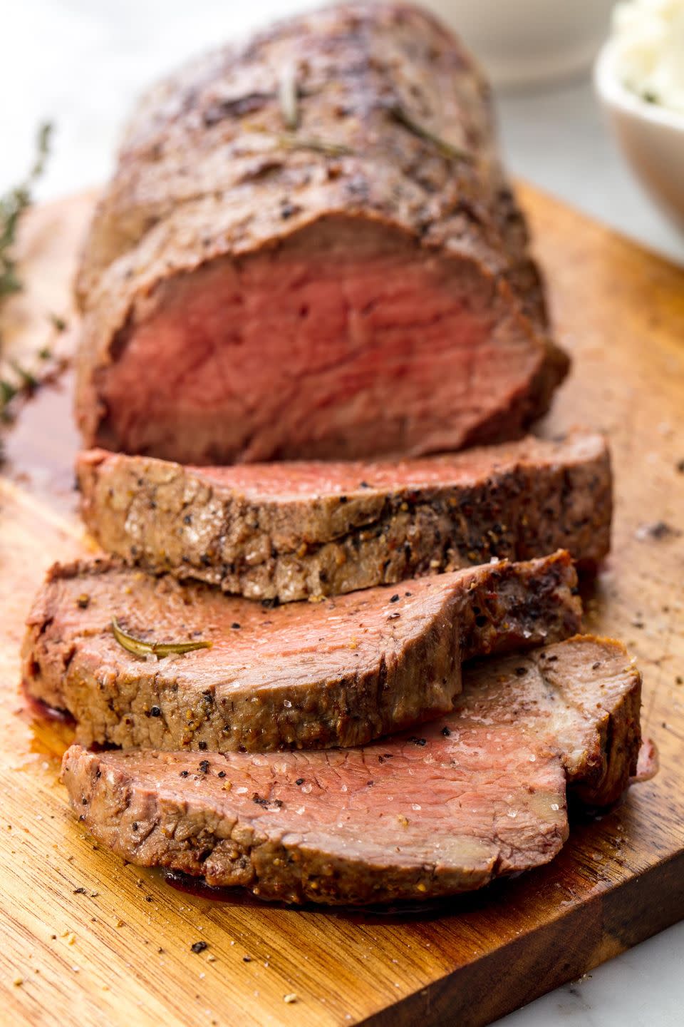 <p>Don't be intimidated by its beauty (and size): beef tenderloin is actually insanely easy to make thanks to a marinade made up of ingredients you probably already have on hand, and a surprisingly quick cook time. </p><p>Get the <a href="https://www.delish.com/cooking/recipe-ideas/recipes/a55651/best-beef-tenderloin-recipe/" rel="nofollow noopener" target="_blank" data-ylk="slk:Beef Tenderloin recipe;elm:context_link;itc:0;sec:content-canvas" class="link "><strong>Beef Tenderloin recipe</strong></a>.</p>