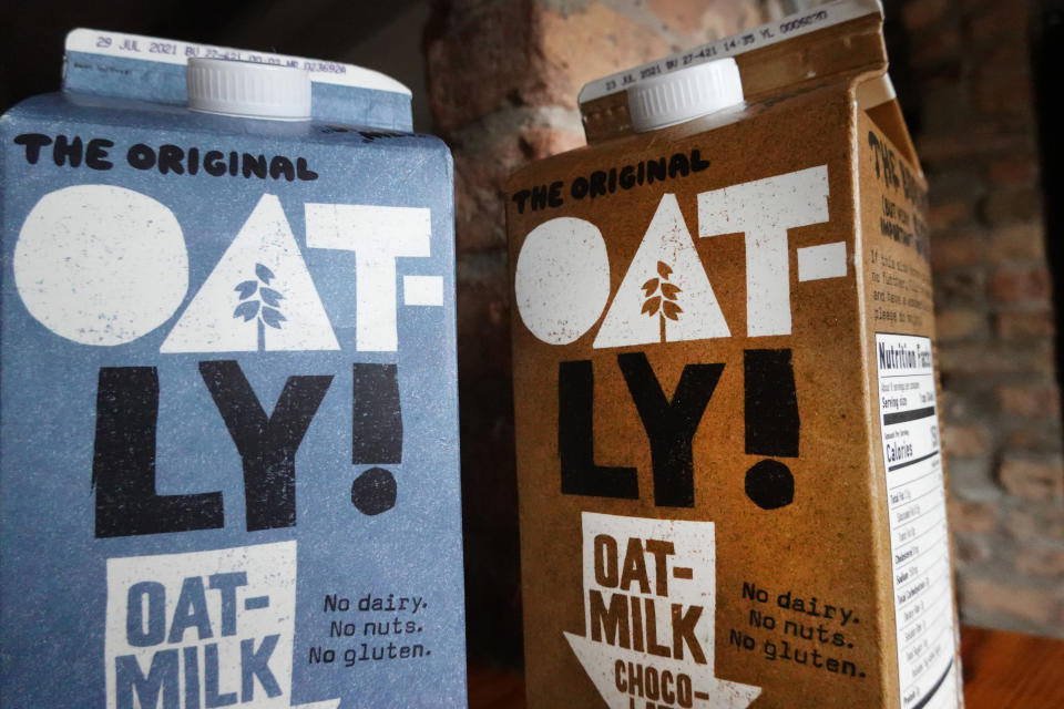 CHICAGO, ILLINOIS - MAY 20: Oatly oat milk and chocolate oat milk are shown on May 20, 2021 in Chicago, Illinois. Oatly began trading on the Nasdaq today after listing its initial public offering at $17-per-share, giving the company an implied valuation of $10 billion. (Photo Illustration by Scott Olson/Getty Images)