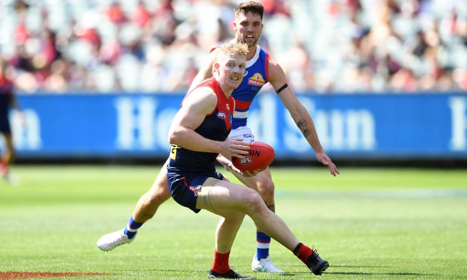 <span>Clayton Oliver gathered 35 disposals for Melbourne against Western Bulldogs as the AFL midfielder starts getting back to his best and repaying the Demons’ loyalty.</span><span>Photograph: Julian Smith/AAP</span>