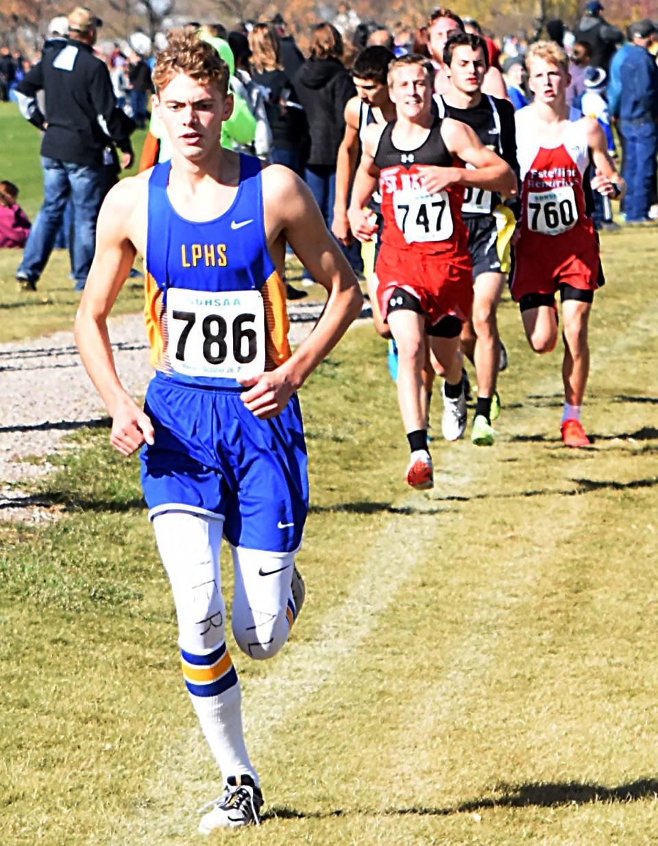 Rhett McMasters of Lake Preston (left) and Riley Benning of Estelline-Hendricks (right) each recorded top-10 finishes in the Class B boys’ race during the 2019 State High School Cross Country Meet at the Broadland Creek Golf Course in Huron. McMasters was fourth and Benning sixth.