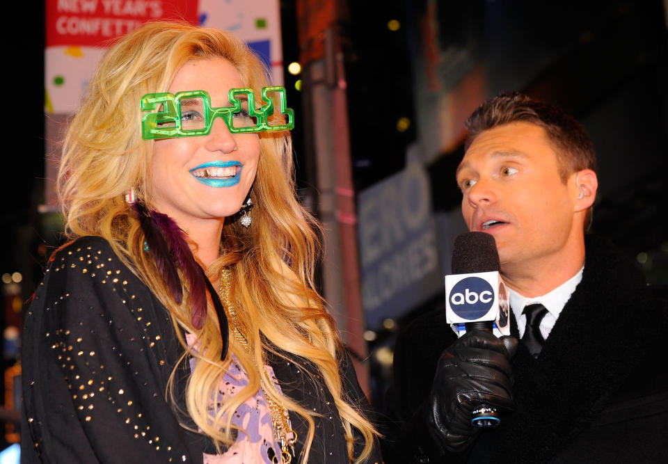 Poor Ryan Seacrest looks a little shocked by Ke$ha's electric blue lips at Dick Clark's New Year's Rockin' Eve in 2011.