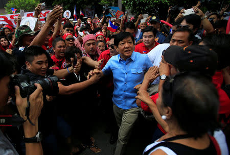 Former senator Ferdinand "Bongbong" Marcos Jr and son of late former dictator Ferdinand Marcos is greeted by his supporters upon his arrival at the Supreme Court in metro Manila, Philippines April 17, 2017. REUTERS/Romeo Ranoco