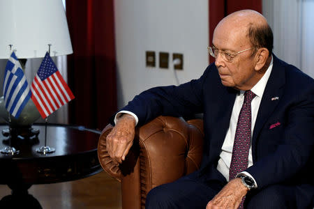 FILE PHOTO: U.S. Commerce Secretary Wilbur Ross meets with Greek Prime Minister Alexis Tsipras (not pictured) at his office in Thessaloniki, Greece, September 7, 2018. REUTERS/Alexandros Avramidis/File Photo