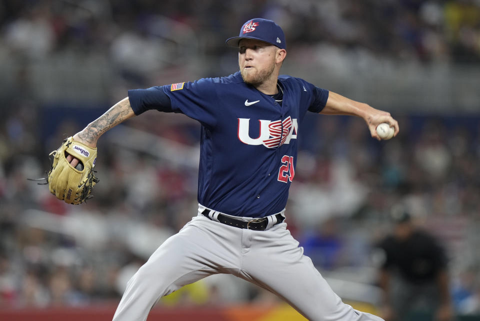 U.S. pitcher Kyle Freehand (21) throws during fourth inning of a World Baseball Classic championship game against Japan, Tuesday, March 21, 2023, in Miami. (AP Photo/Wilfredo Lee)