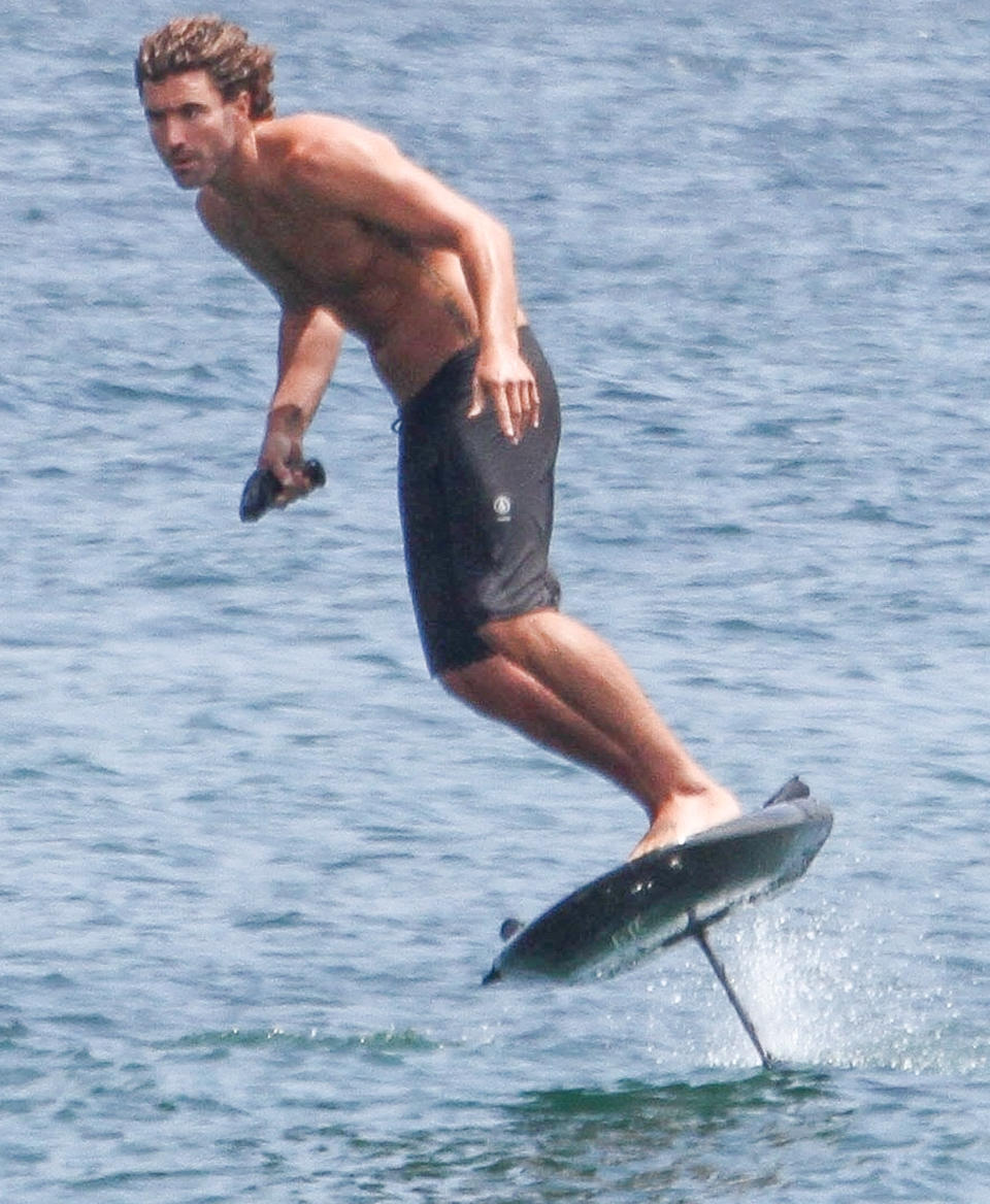 <p>Brody Jenner glides above the ocean on Monday while riding his electric hydrofoil surfboard in Malibu.</p>