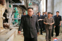 FILE PHOTO: North Korea's leader Kim Jong Un tours a factory in Sinuiju, North Korea, in this undated photo released by North Korea's Korean Central News Agency (KCNA) July 2, 2018. REUTERS/KCNA
