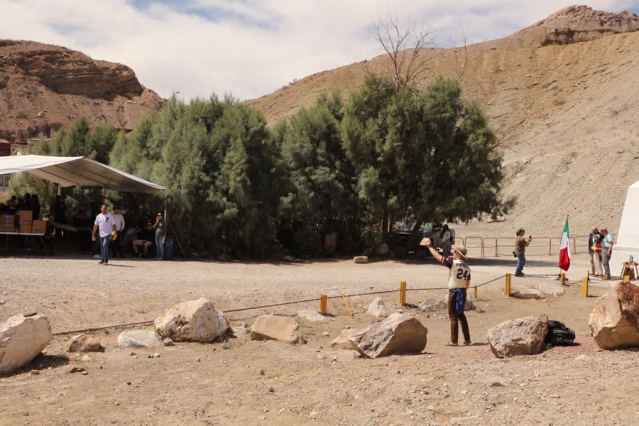 Man waiting for baseball across U.S. – Mexico border | Photo Courtesy of Sister Cities International