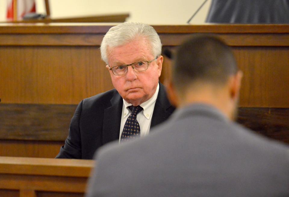 Clerk-magistrate Keith McDonough listens to Barnstable Police Lt. Joseph Green testify during a show cause hearing on Tuesday in Barnstable District Court regarding an incident involving West Barnstable resident Reid Mason in February. McDonough is a clerk-magistrate in Lawrence District Court.