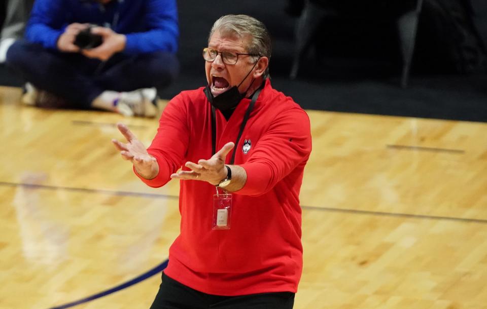 Geno Auriemma coaches the Huskies against Marquette on March 8.