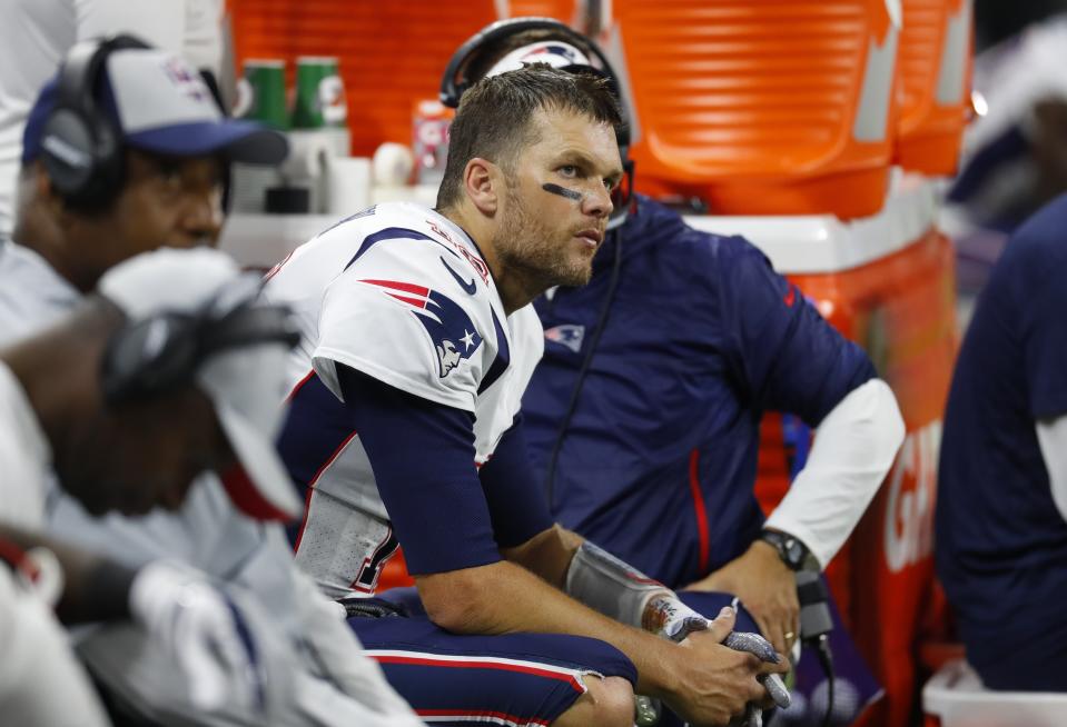 New England Patriots quarterback Tom Brady sits on the bench during the second half of an NFL football game against the Detroit Lions, Sunday, Sept. 23, 2018, in Detroit. (AP Photo/Paul Sancya)