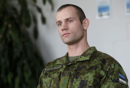 Estonian army captain Vladimir Kuznetsov listens during an interview in Tapa, Estonia February 16, 2017. REUTERS/Ints Kalnins