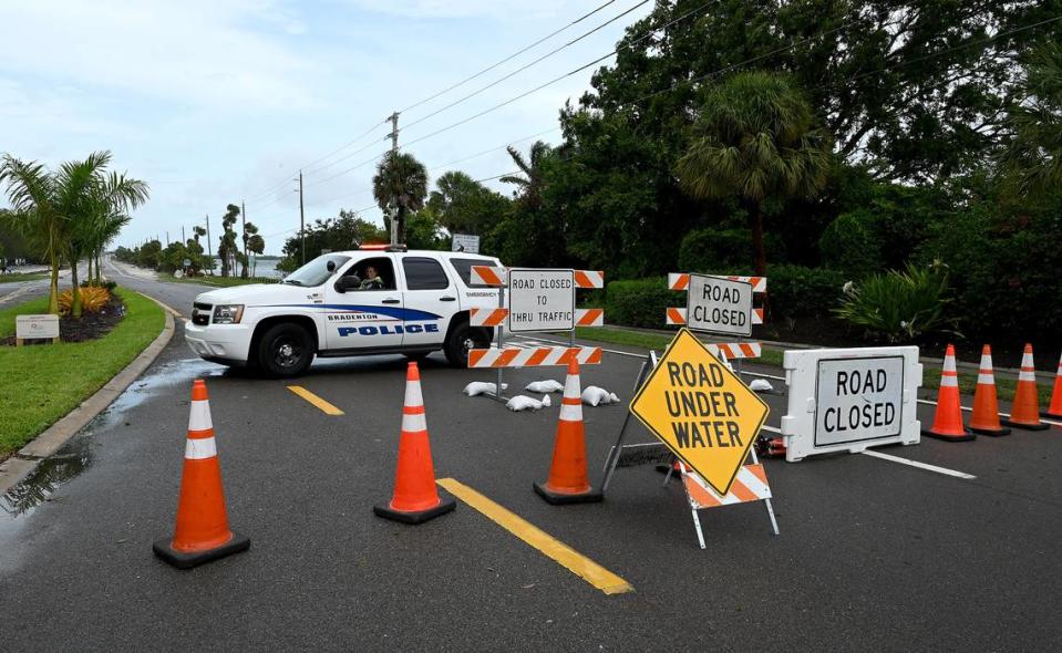 A roadblock bars traffic onto Palma Sola Causeway after Hurricane Idalia passed on August 30, 2023.