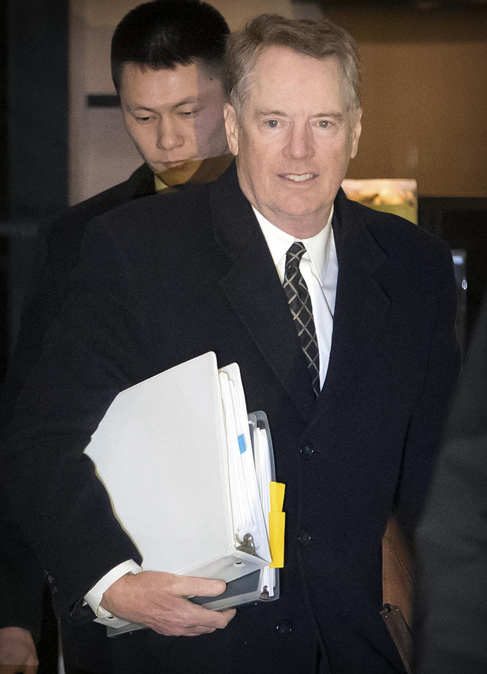 U.S. Trade Representative Robert Lighthizer arrives at his hotel in Beijing, Wednesday, Feb. 13, 2019. U.S. Treasury Secretary Steven Mnuchin and Lighthizer arrived in China's capital on Tuesday to hold a new round of high-level trade talks with China on Feb. 14-15. (AP Photo/Mark Schiefelbein)