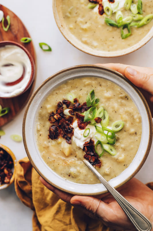 <p>Minimalist Baker</p><p>Creamy, comforting, flavorful potato leek soup that’s plant-based, gluten-free and easy to make. Made in 1 pot with just 9 simple ingredients!</p><p><strong>Get the recipe: <a href="https://minimalistbaker.com/creamy-potato-leek-soup-vegan/" rel="nofollow noopener" target="_blank" data-ylk="slk:Creamy Vegan Potato and Leek Soup;elm:context_link;itc:0;sec:content-canvas" class="link "><em>Creamy Vegan Potato and Leek Soup</em></a></strong></p><p><strong>Related: <a href="https://www.yahoo.com/lifestyle/21-grilled-cheese-tomato-soup-201040590.html" data-ylk="slk:21 Grilled Cheese and Tomato Soup Recipes;elm:context_link;itc:0;sec:content-canvas;outcm:mb_qualified_link;_E:mb_qualified_link;ct:story;" class="link  yahoo-link">21 Grilled Cheese and Tomato Soup Recipes</a></strong></p>