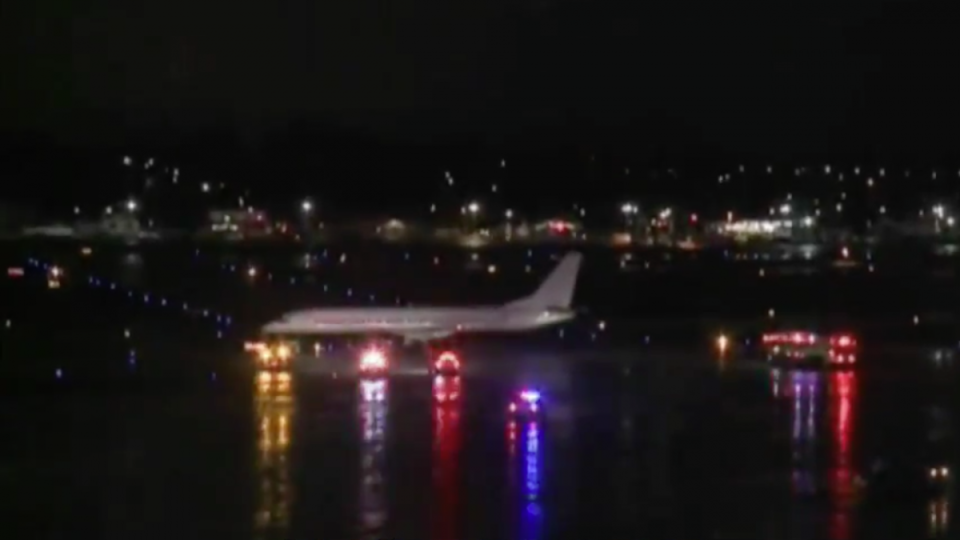 Emergency personnel respond to the Miami Heat's charter plane in Milwaukee. (@abcWNN screenshot)