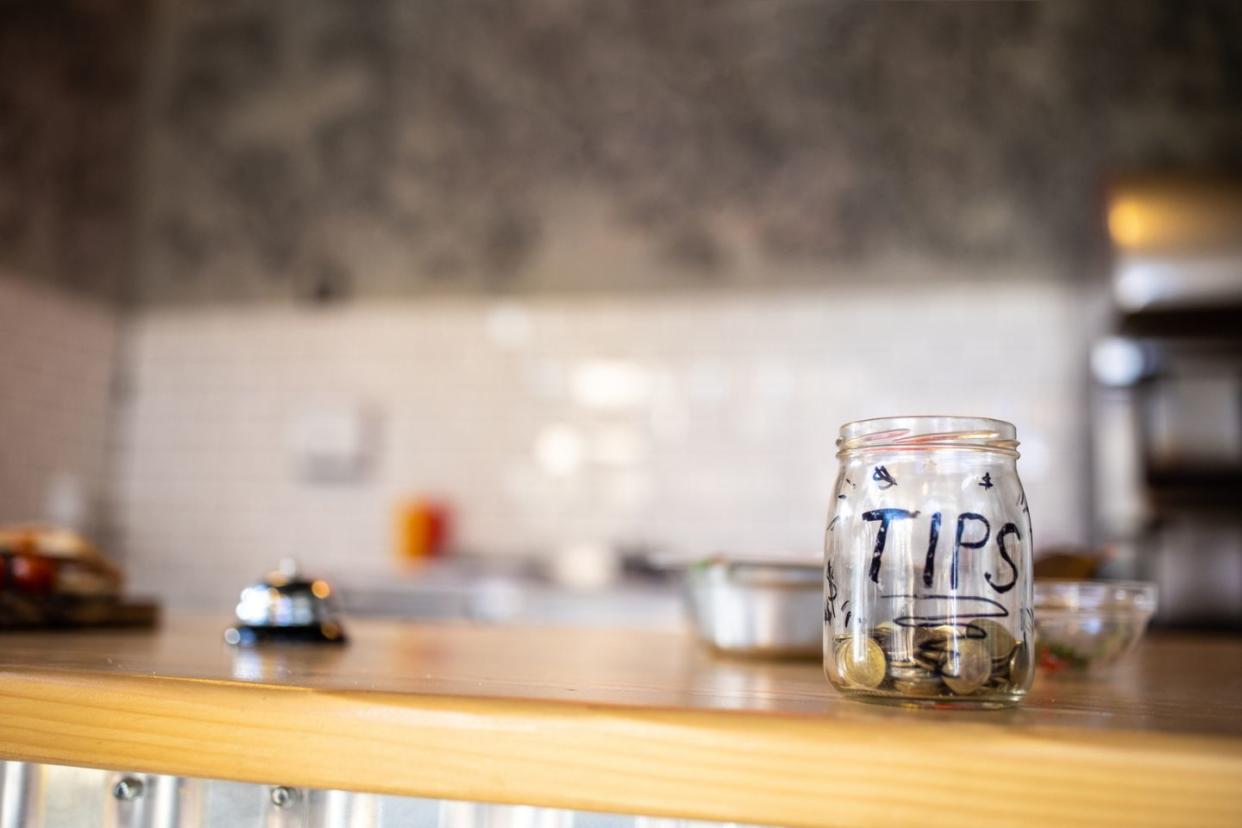 tip jar on restaurant counter