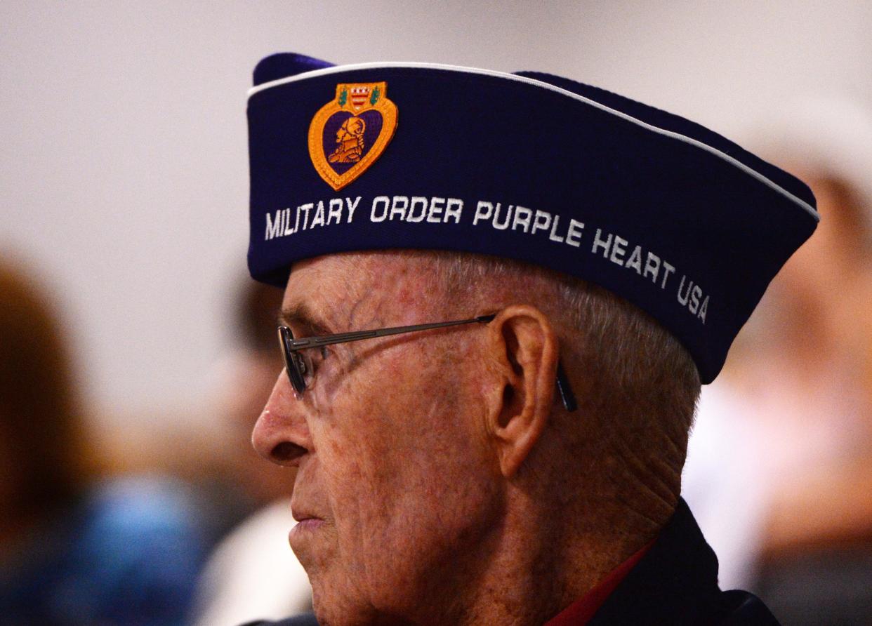 Jim Daniels, a World War II Navy Seabee and master chief, attends a 2014 event declaring the city of Oxnard a Purple Heart City. Daniels also served on the Port Hueneme City Council and as the city's mayor. He died July 24.