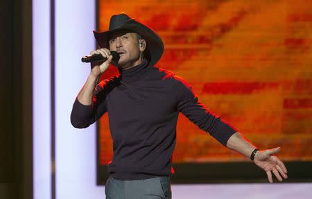 Singer Tim McGraw performs "Overrated" during the taping of "A Very GRAMMY Christmas" at the Shrine Auditorium in Los Angeles, California in this November 18, 2014 file photo. REUTERS/Mario Anzuoni/Files