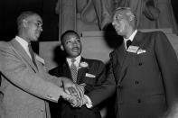 <p>Pictured left to right at the Freedom Pilgrimage rally at the Lincoln Memorial, Washington, D.C., May 17, 1957, are: Roy Wilkins of New York, executive secretary of the NAACP; the Rev. Martin Luther King, Jr. of Montgomery, Ala.; and A. Philip Randolph of New York, president of the Brotherhood of Sleeping Car Porters. (AP Photo/Charles Gorry) </p>