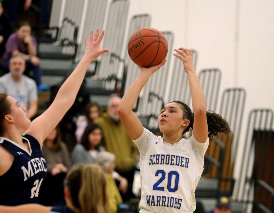 Mariah Watkins (20) and the Webster Schroeder girls are ranked No. 3 in the state among Class AA teams.
