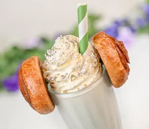 Princess of Alderaan Shake: Salted caramel shake topped with whipped cream, edible glitter, and mini cinnamon rolls