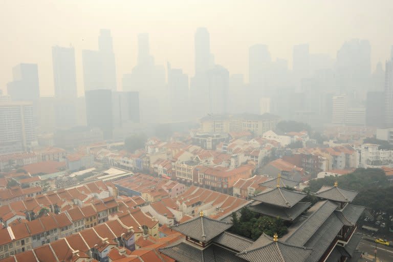 A general view shows part of Singapore, shrouded by haze, on June 20, 2013