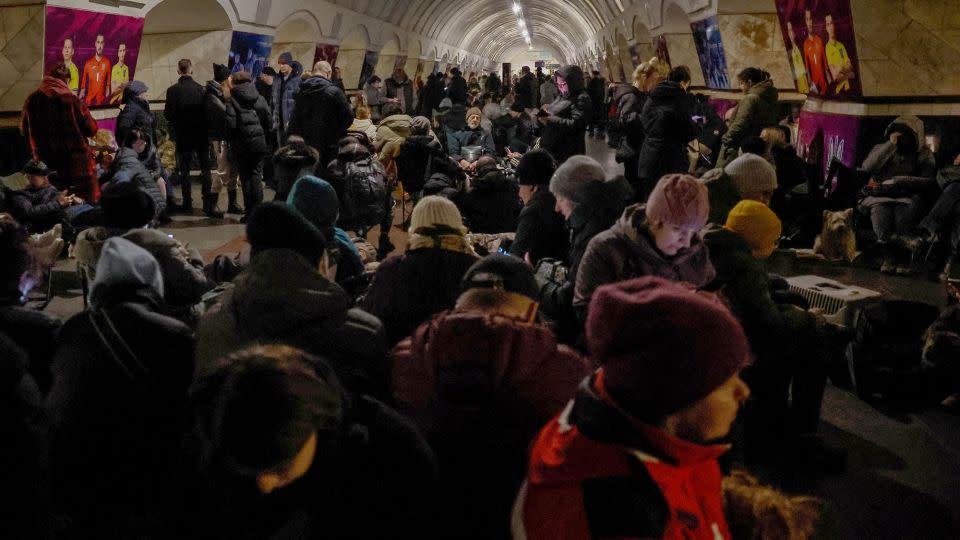 People take shelter inside a metro station in Kyiv during the missile barrage. - Alina Smutko/Reuters