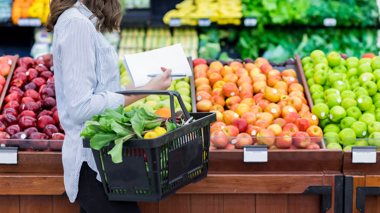 Woman shopping in produce department