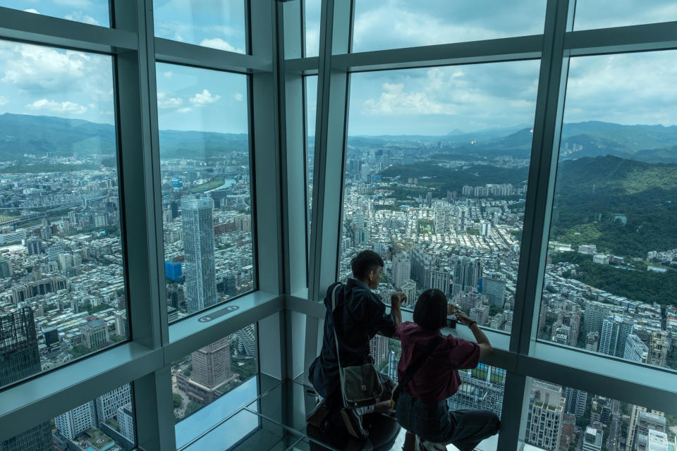 Visitors at the observation floor of the Taipei 101 building. (Photo: Lam Yik Fei/Bloomberg)