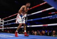 Amir Khan says he’s ‘peeing blood’ after low blow as he hits back over claims he quit against Terence Crawford