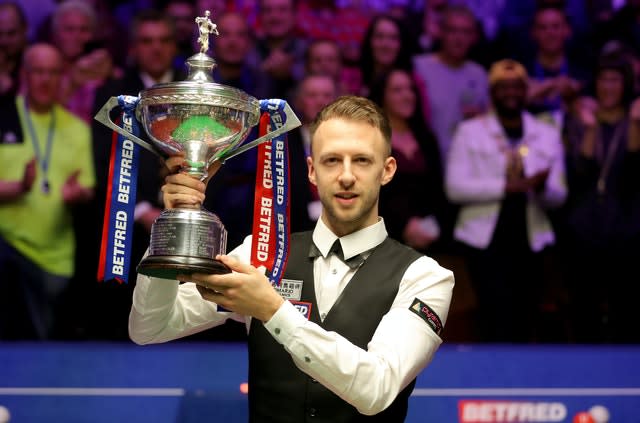 Judd Trump, the reigning world champion, trails Kyren Wilson