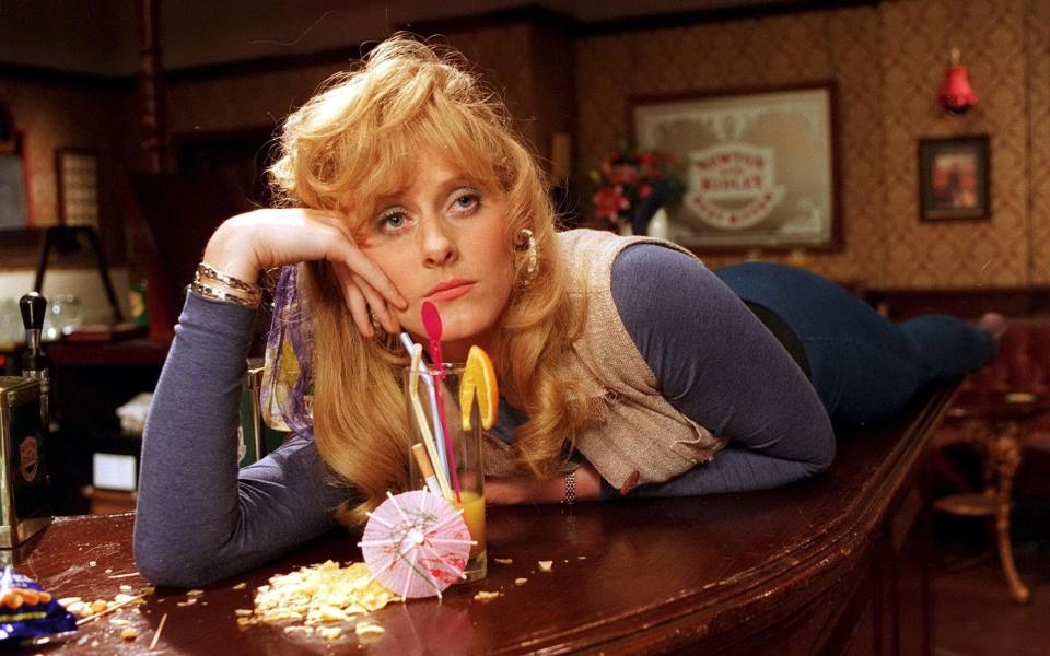 Sarah Lancashire as barmaid Raquel in Coronation Street in 1994 - ITV/Shutterstock