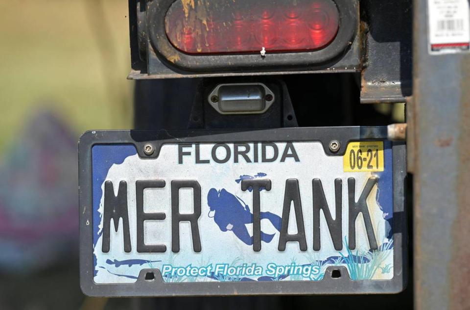 A former sea turtle aquarium from a Florida zoo has been transformed into a portable mermaid tank, but still carries the former Mer Tank license plate. Tammy Ljungblad/tljungblad@kcstar.com