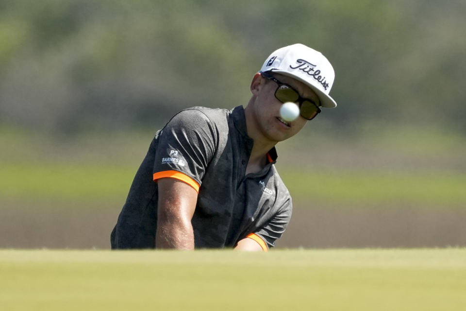 Garrick Higgo, of South Africa, chips to the green on the third hole during a practice round at the PGA Championship golf tournament on the Ocean Course Tuesday, May 18, 2021, in Kiawah Island, S.C. (AP Photo/David J. Phillip)