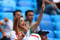 <p>A female fan of Iran waves prior to the 2018 FIFA World Cup Russia group B match between Morocco and Iran at Saint Petersburg Stadium on June 15, 2018 in Saint Petersburg, Russia. (Photo by Robbie Jay Barratt – AMA/Getty Images) </p>